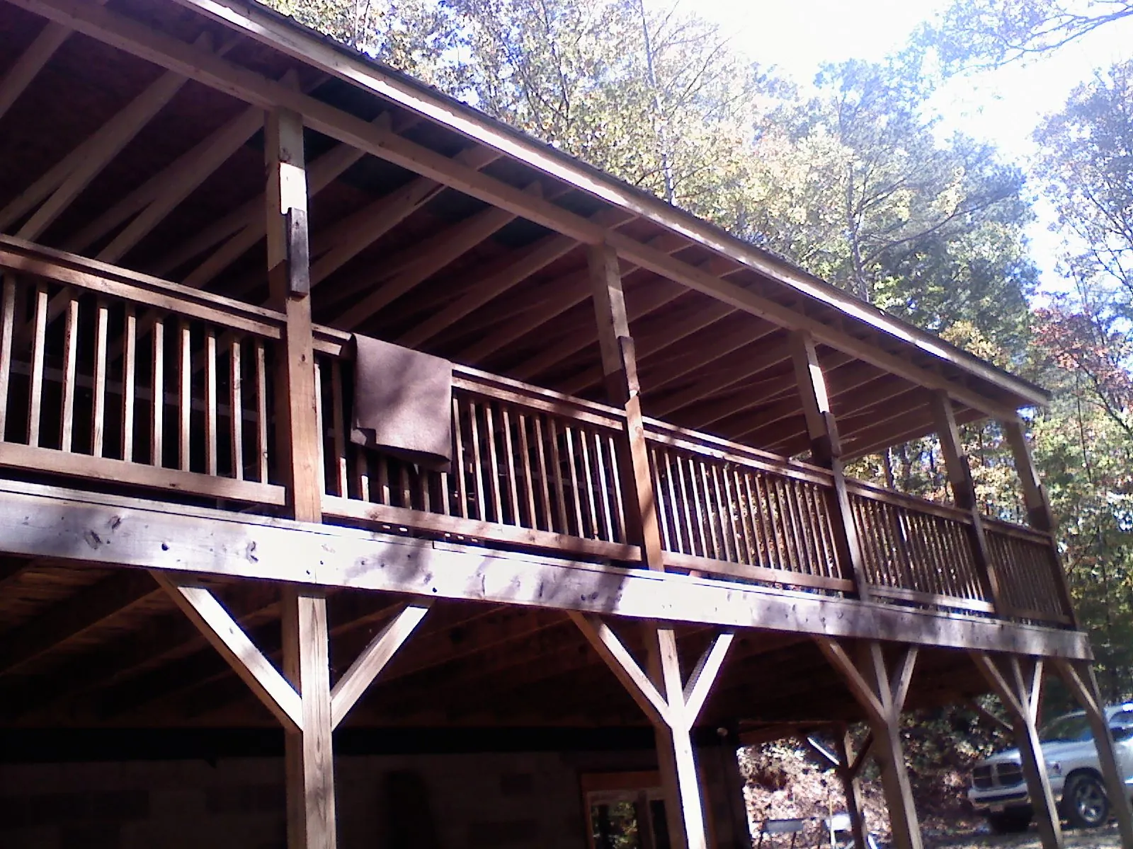 Timber framing under a new elevated porch and deck — Roof Leak Repair in Pawcatuck by Roofing Brothers